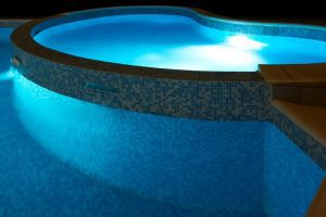 Underwater pool lights can create a resort-like atmosphere in your backyard